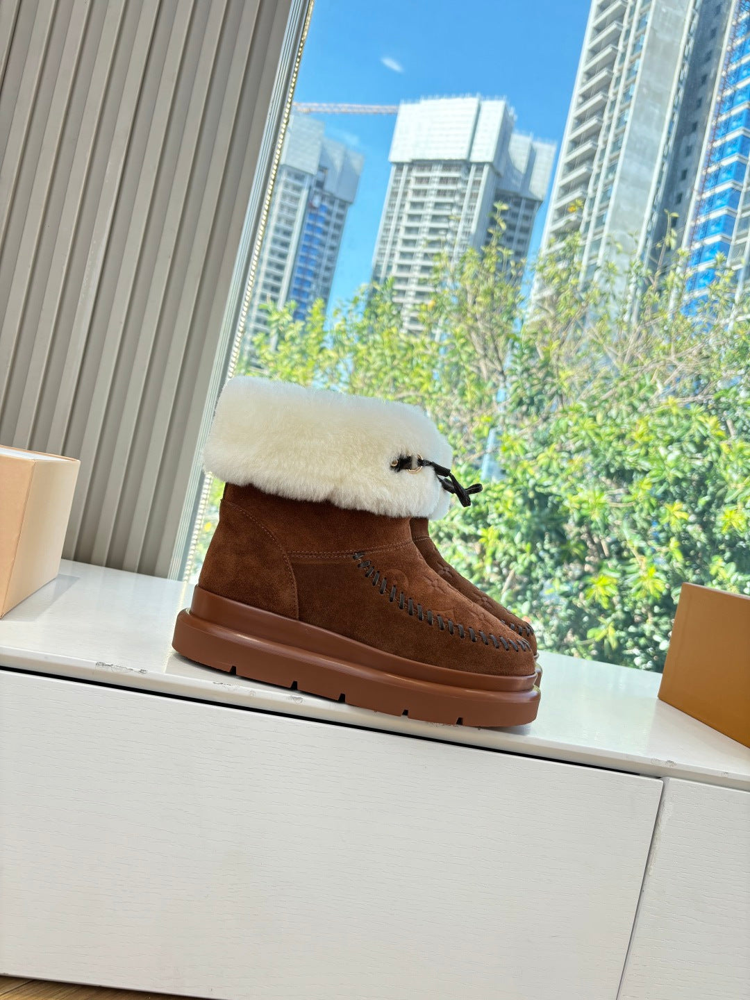 Louis Vuitton unisex brown suede boot with cream shearling cuff and lace-up detail