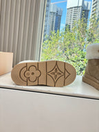 Louis Vuitton unisex boot outsole with floral and monogram-style embossed pattern