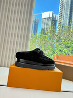 Louis Vuitton unisex black velvet loafer on orange box with thick black platform sole
