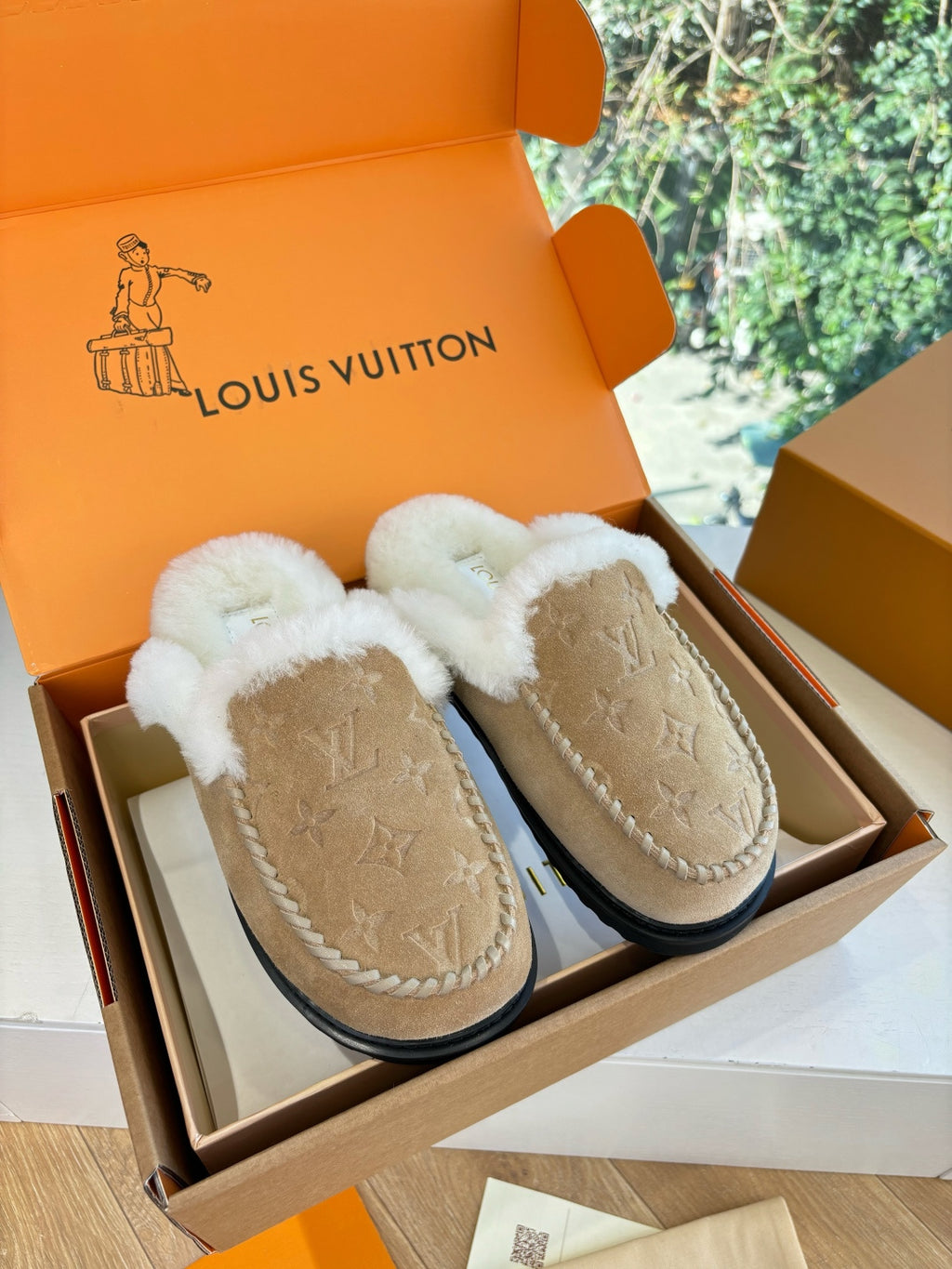 Louis Vuitton shearling moccasin slippers, tan with white fur trim