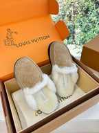 Louis Vuitton shearling moccasin slippers, tan suede with white cross-over fur