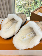 Louis Vuitton shearling slide slippers, tan with white fur and printed logo