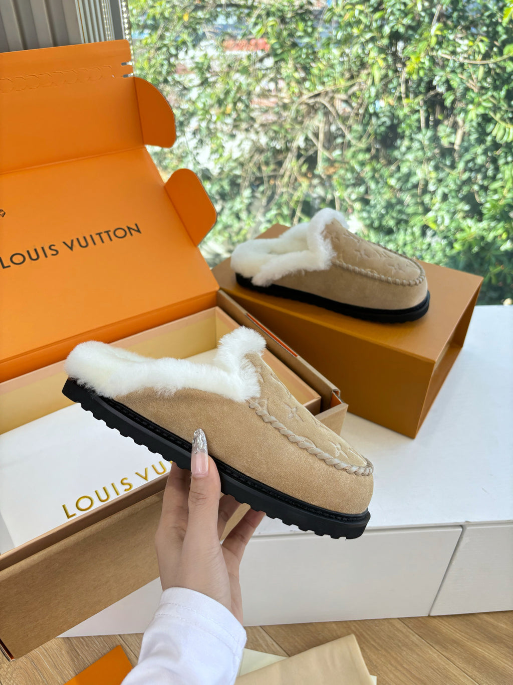 Louis Vuitton shearling moccasin slipper, tan suede with white fur lining and sole