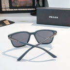 Prada sunglasses with blue frames and slate-tinted lenses