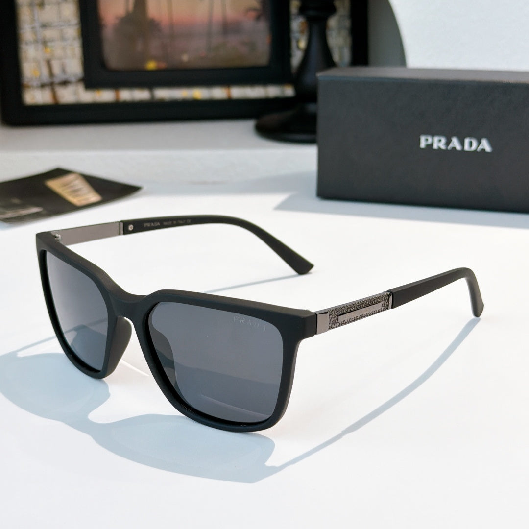 Prada sunglasses with black frames and dark blue lenses