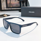 Rectangular sunglasses with blue frame and dark gray lenses