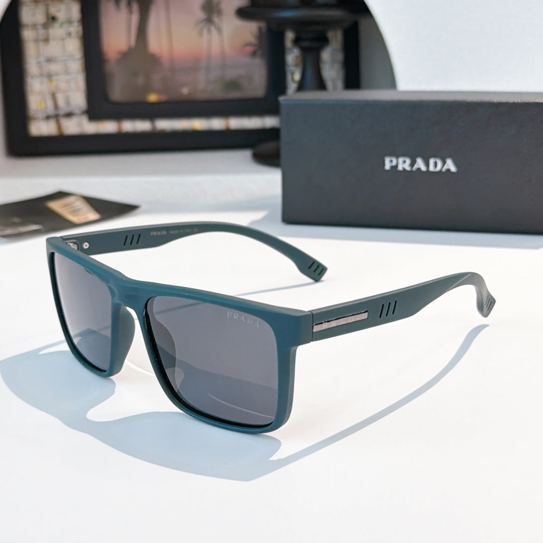 Rectangular sunglasses with teal frame and dark gray lenses