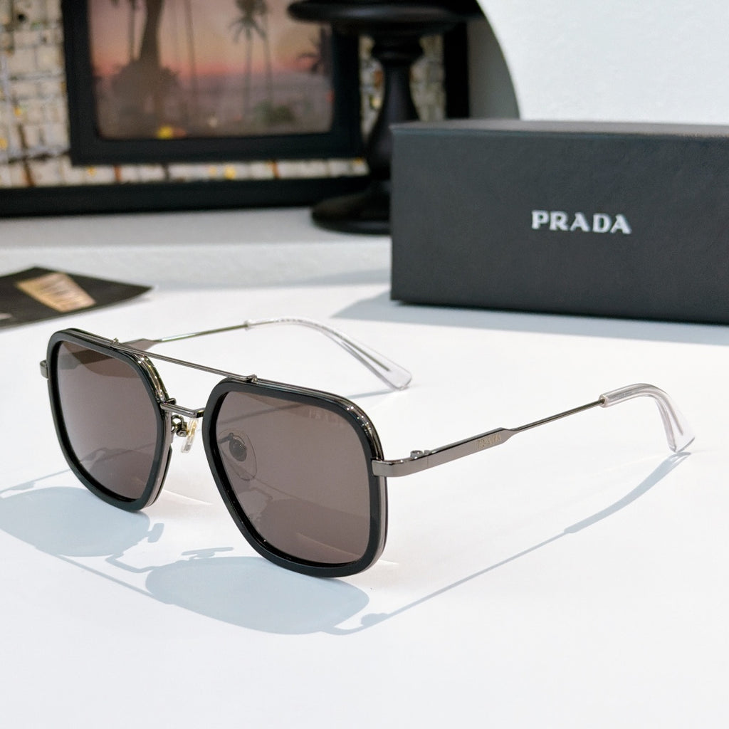 Prada sunglasses with brown lenses, black frames, and silver-tone metal arms