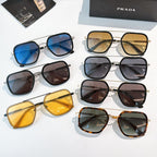 Prada sunglasses assortment with mixed colored lenses and gold-tone frames