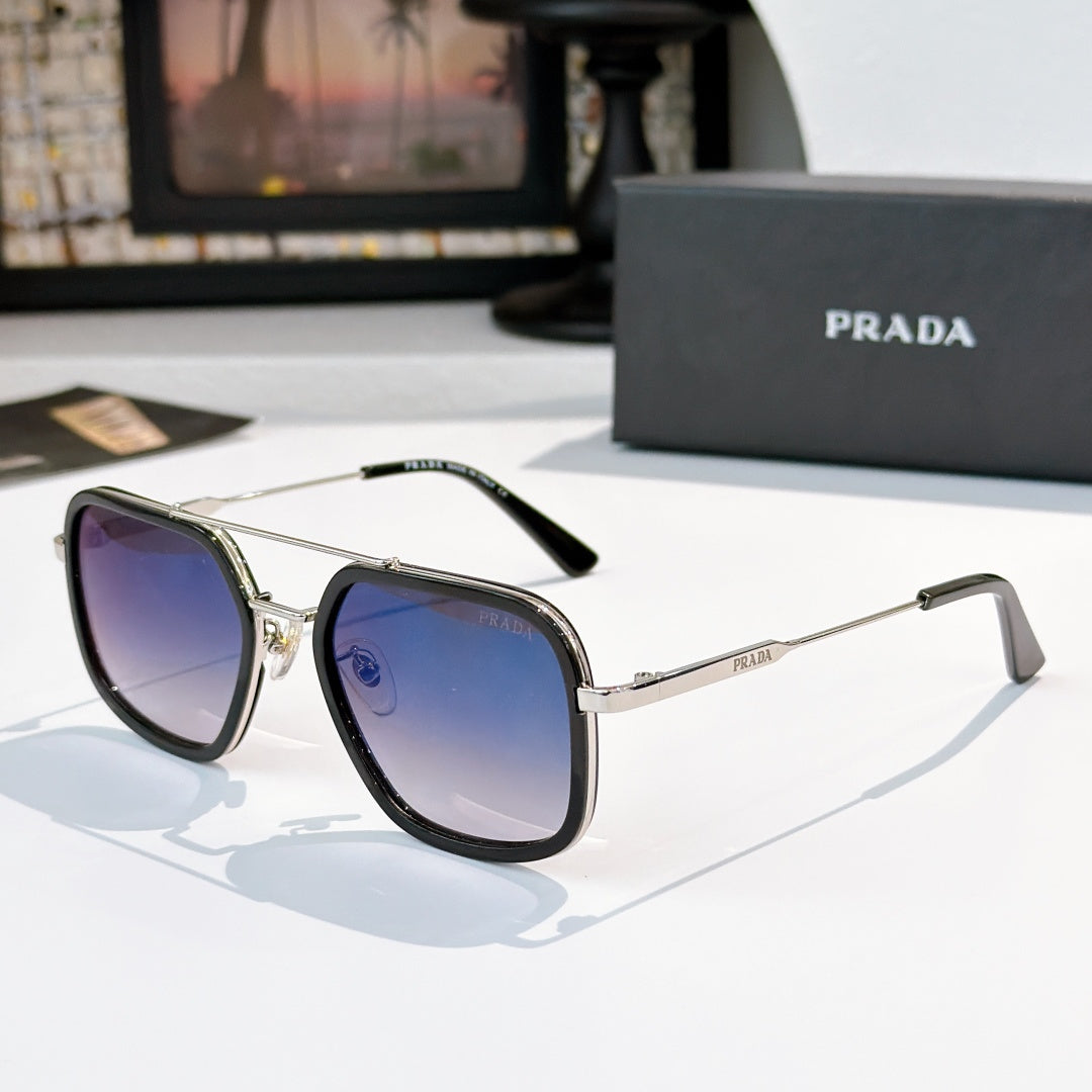 Prada sunglasses with blue lenses, black frames, and gold-tone metal arms