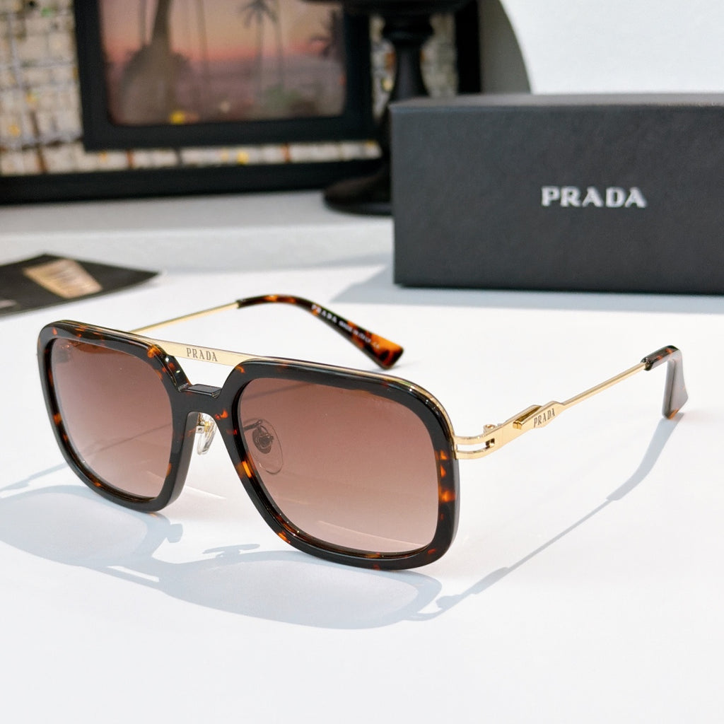 Prada sunglasses with tortoiseshell frame and rose-tinted lenses