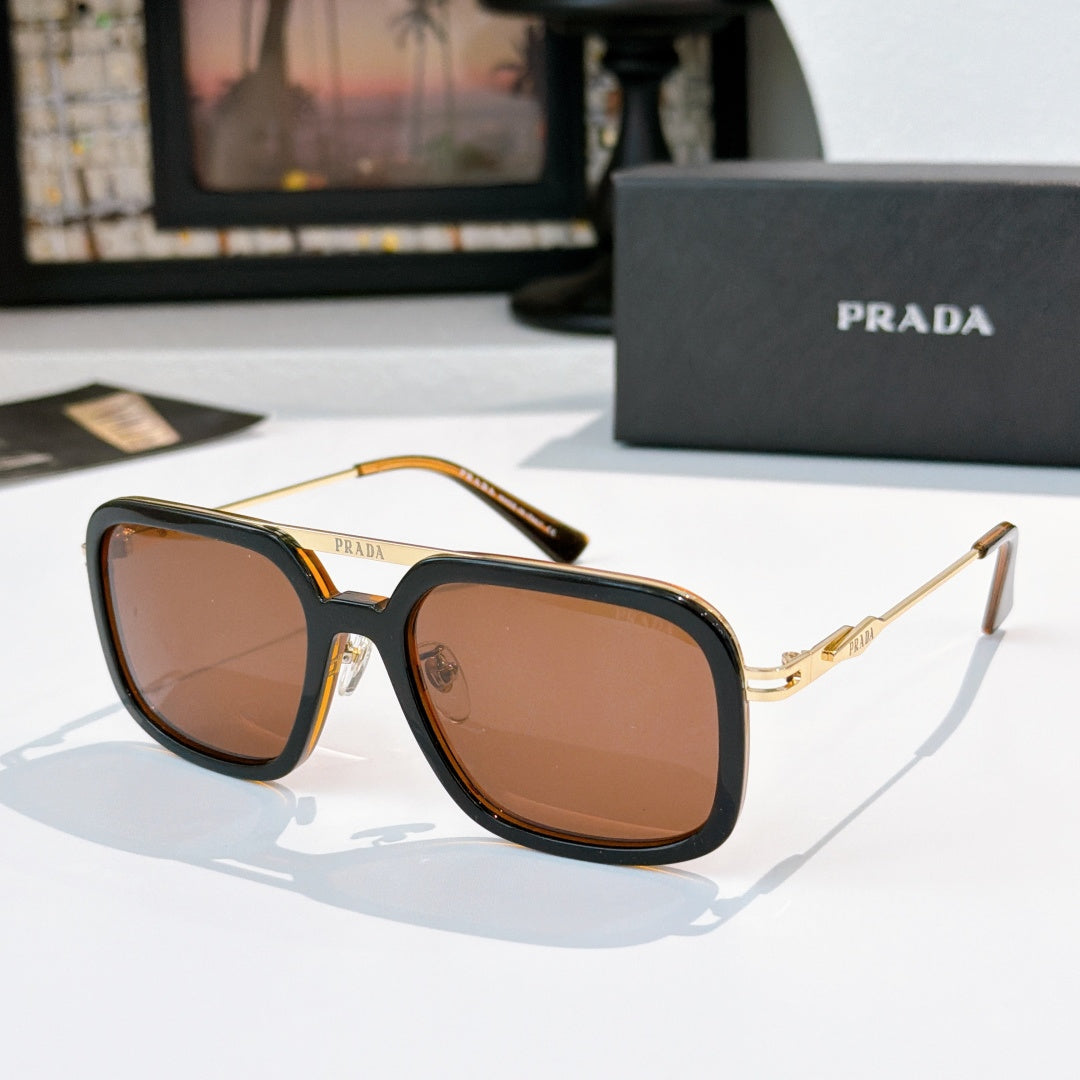 Prada sunglasses with amber frame and brown-tinted lenses