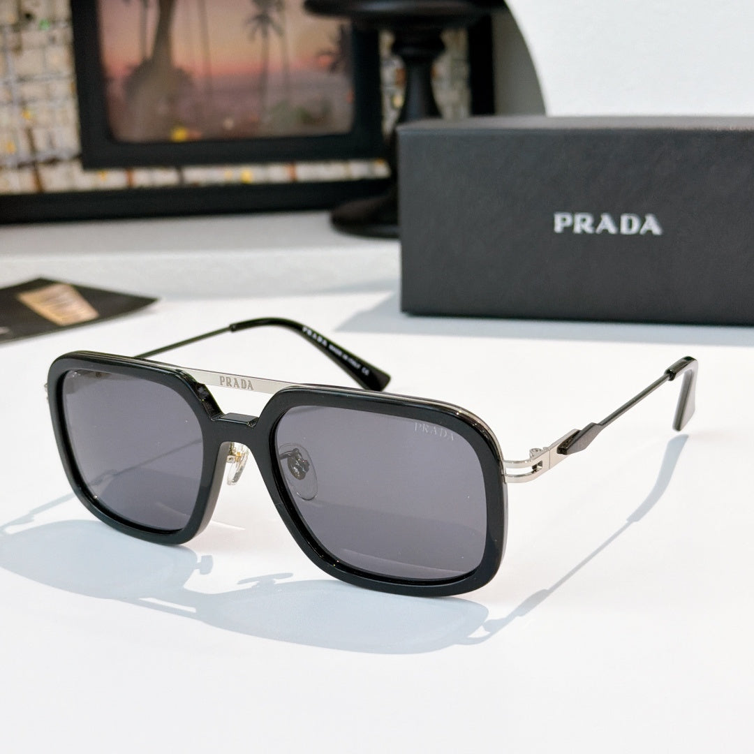 Prada sunglasses with black frame and smoky gray lenses