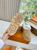 Louis Vuitton loafer outsole, tan rubber sole embossed with monogram pattern