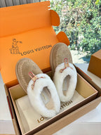 Louis Vuitton shearling loafers, tan suede with white fur collar and front strap