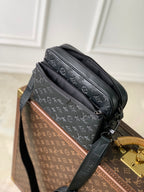 Louis Vuitton monogram crossbody bag with gold-tone clasp and adjustable strap