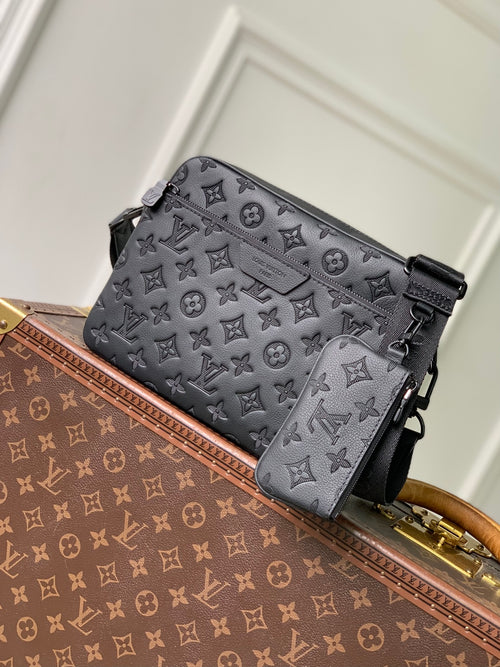 Louis Vuitton monogram crossbody bag in dark gray with top zip and adjustable strap