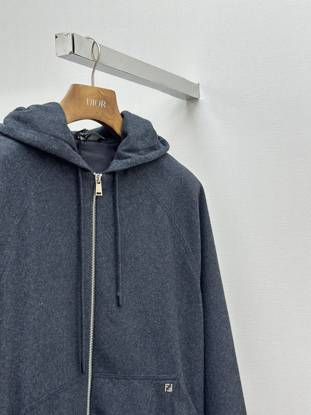 Fendi dark blue hooded zip jacket with front pocket and chest logo patch