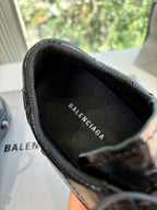 Black leather sneaker interior with Balenciaga logo on insole