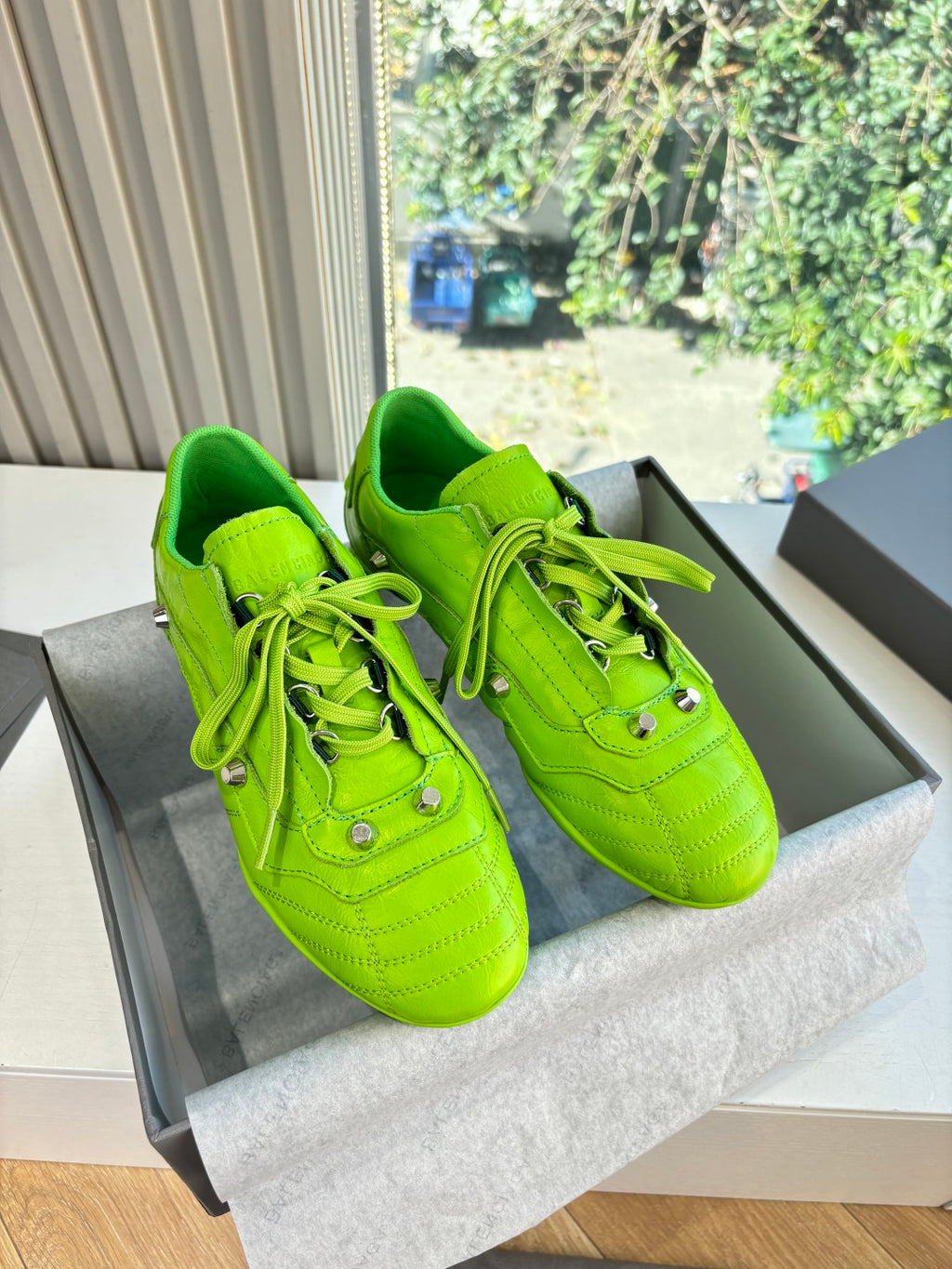 Balenciaga lime green lace-up low-top sneakers with textured panels and metal eyelets