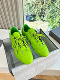 Balenciaga lime green lace-up low-top sneakers with textured panels and metal eyelets