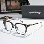 Black and gray rectangular eyeglasses with clear lenses and detailed temple metalwork.