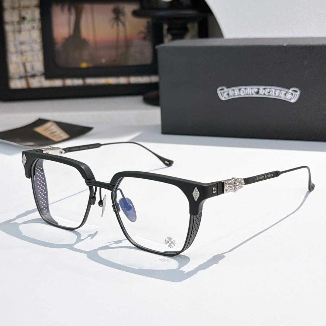 Black and gray rectangular eyeglasses with clear lenses and detailed temple metalwork.