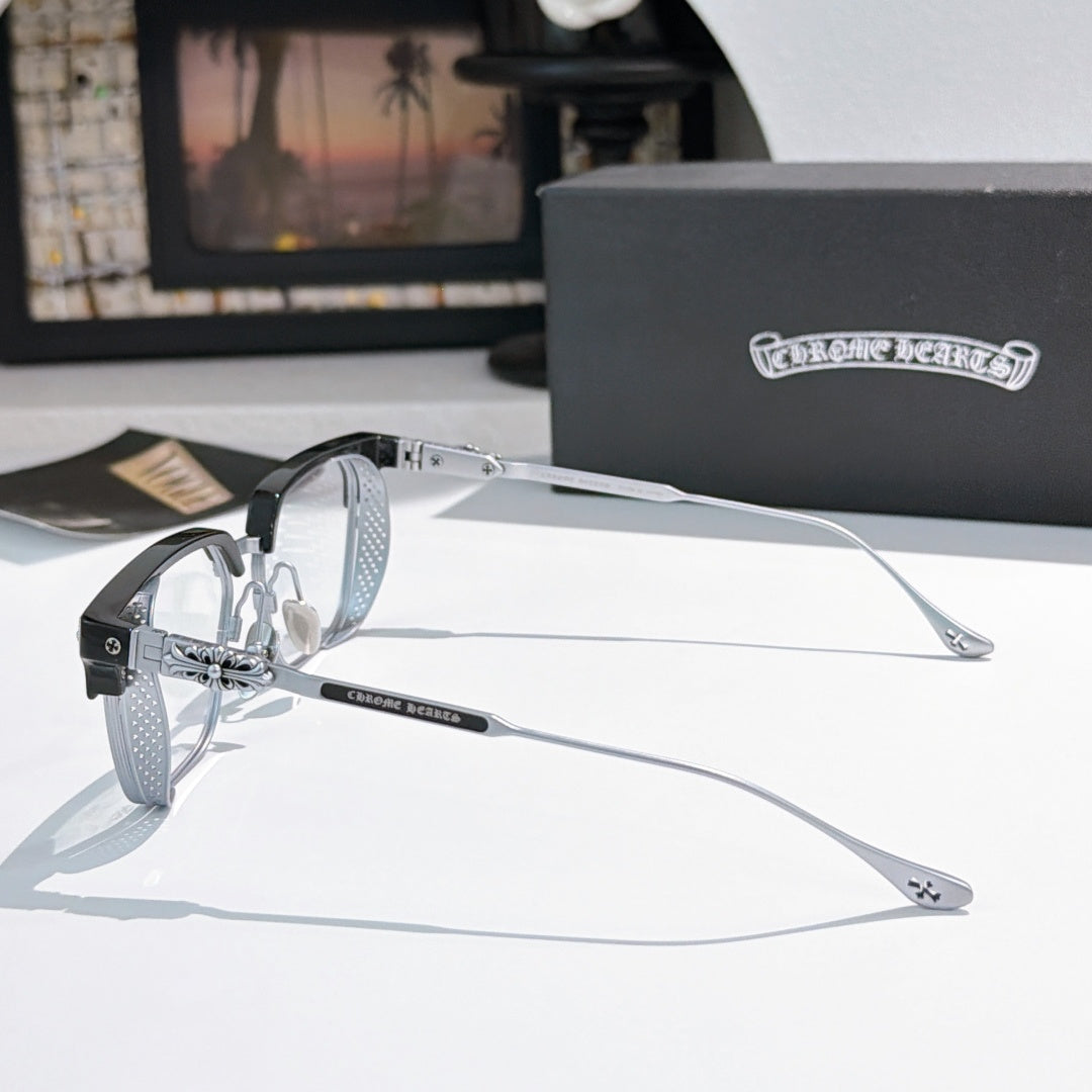 Black and silver eyeglasses with clear lenses, rectangular frames and angled metal temples.