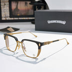 Gold and black eyeglasses with clear lenses, rectangular frame and metal temple details.