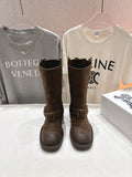 Burberry brown suede buckle tall boots, front view of two boot shafts