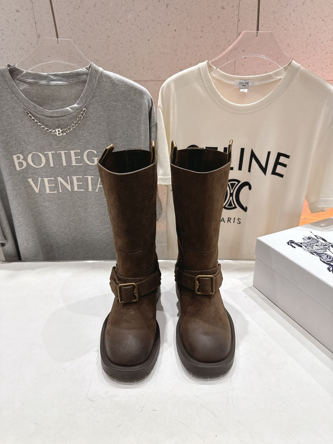 Burberry brown suede buckle tall boots, front view of two boot shafts