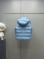 Light blue quilted puffer jacket with hood and front zipper, rear view