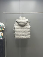 White hooded puffer jacket on hanger with front and back quilted panels