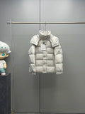 White hooded puffer jacket with quilted panels and front snap placket