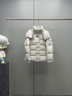 White hooded puffer jacket with quilted panels and front snap placket
