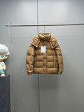 Moncler long puffer jacket in tan with hood, quilted panels, and snap buttons