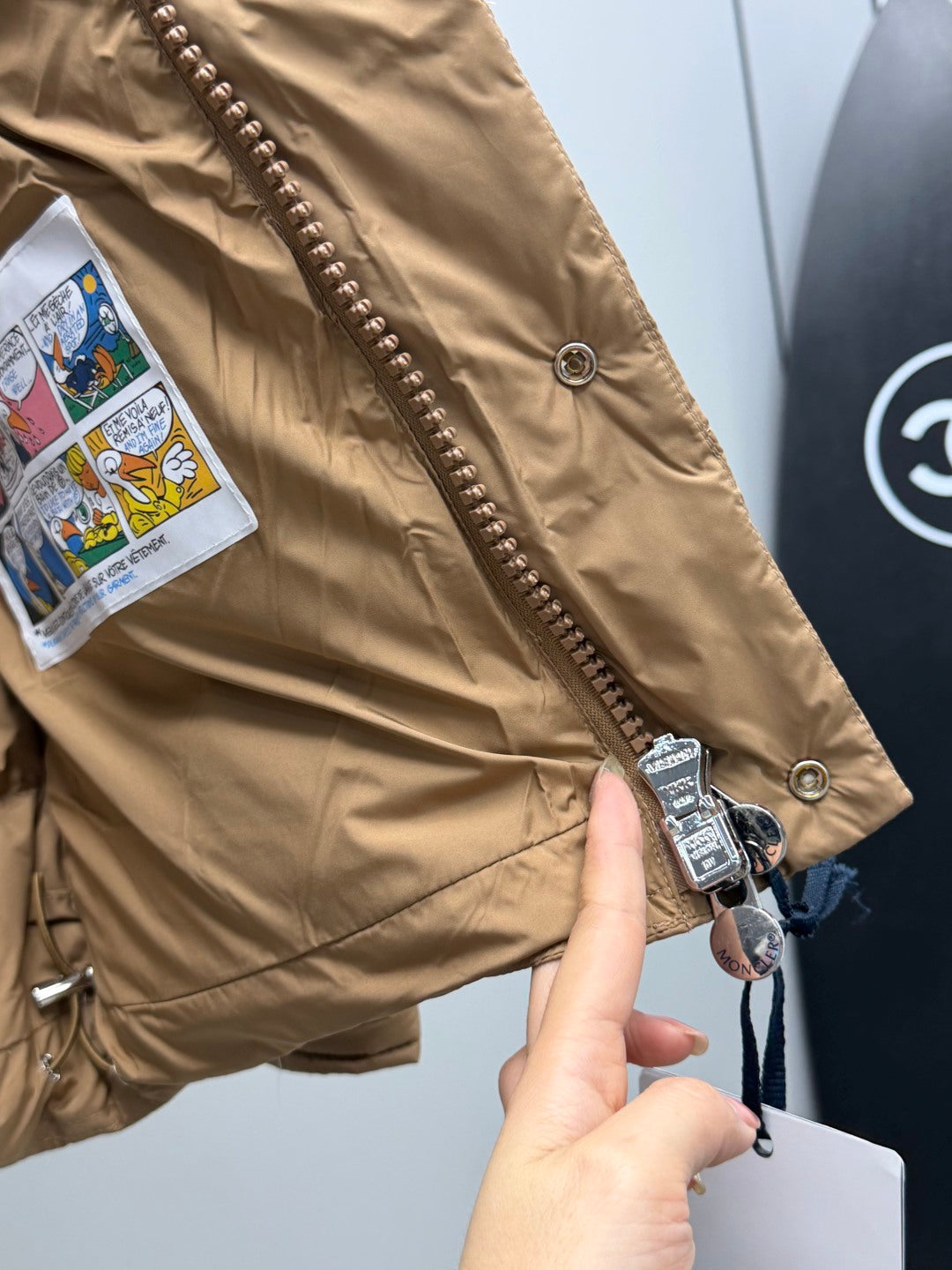 Moncler long puffer jacket tan sleeve with snap buttons and metal zipper trim