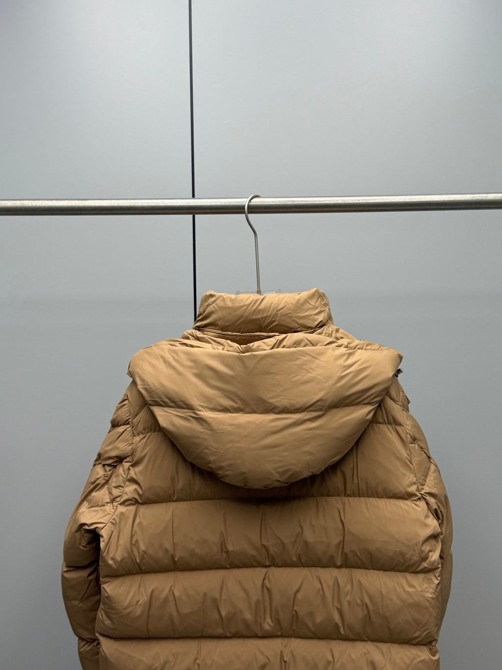 Moncler long puffer jacket in tan with hood and horizontal quilted stripes