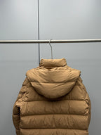 Moncler long puffer jacket in tan with hood and horizontal quilted stripes
