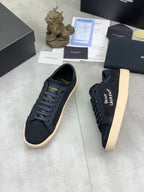 Navy SAINT LAURENT low-top sneakers with lace-up front and beige platform sole