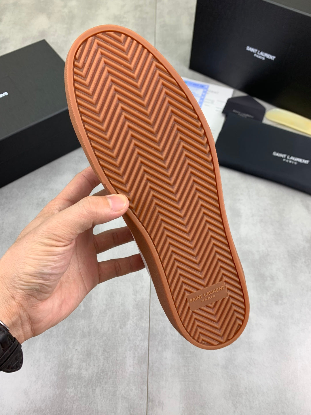 Brown gum outsole with chevron tread pattern