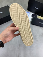 YSL unisex sneakers outsole, tan rubber sole with herringbone tread pattern