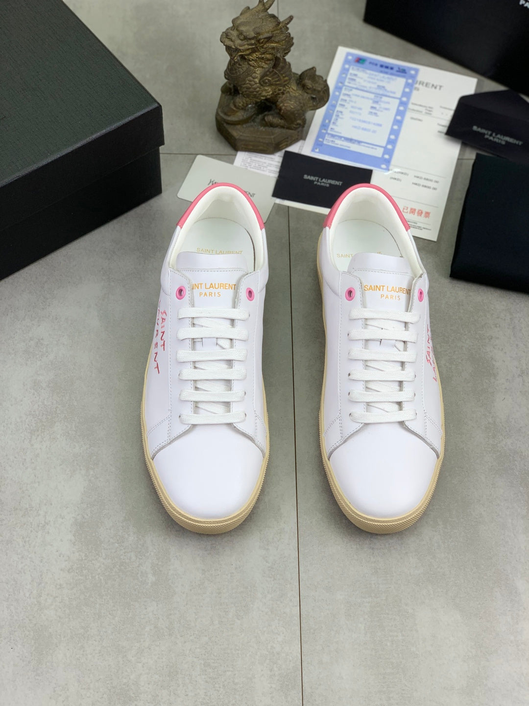 YSL unisex sneakers pair, white uppers with pink lining, lace-up, gum rubber sole