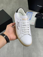 Saint Laurent unisex low-top sneakers, white with beige gum sole and lace-up front