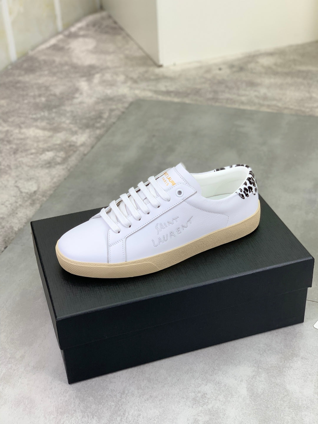 YSL unisex white low-top sneakers with leopard-spotted side panels, beige sole