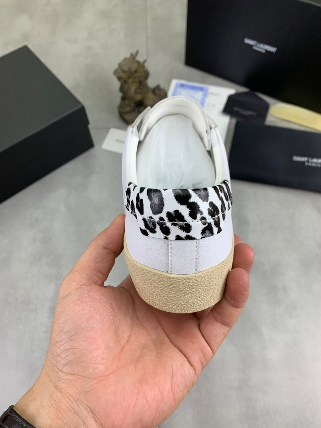 YSL unisex white sneakers with leopard-patterned heel back and beige sole
