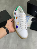 Unisex low-top sneakers, white leather with rainbow star panels and green collar trim