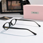 MiuMiu eyeglasses with black frame and clear lenses, side profile view with temple arms