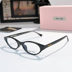 MiuMiu eyeglasses with black frame and clear lenses, round oval front view