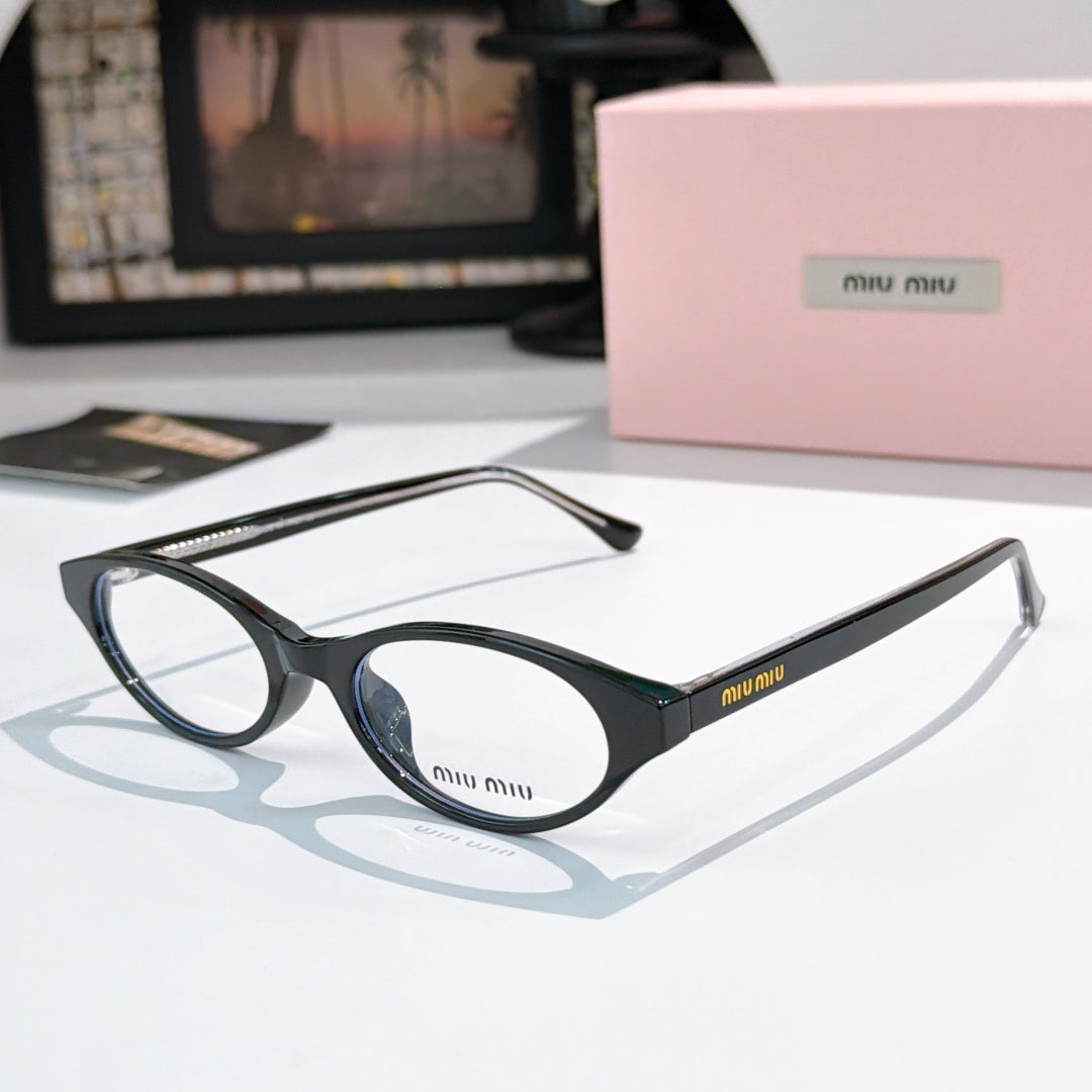 MiuMiu eyeglasses with black frame and clear lenses, round oval front view